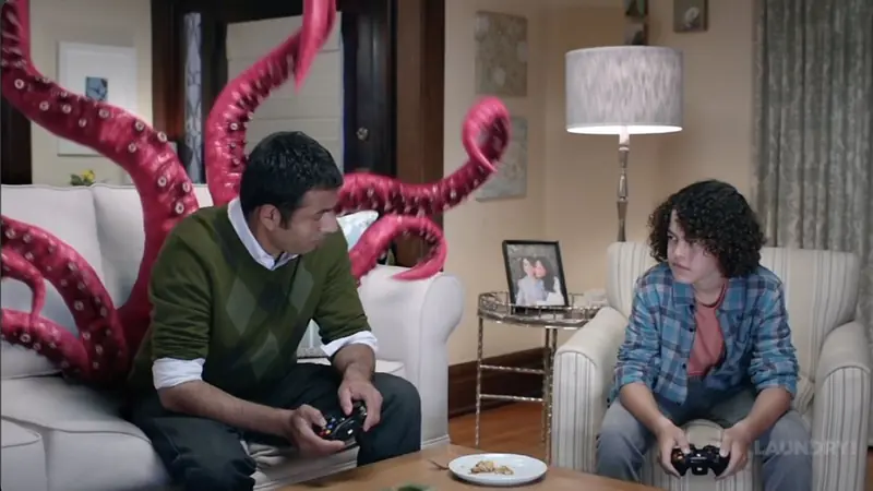 Live-action scene with surreal pink tentacles